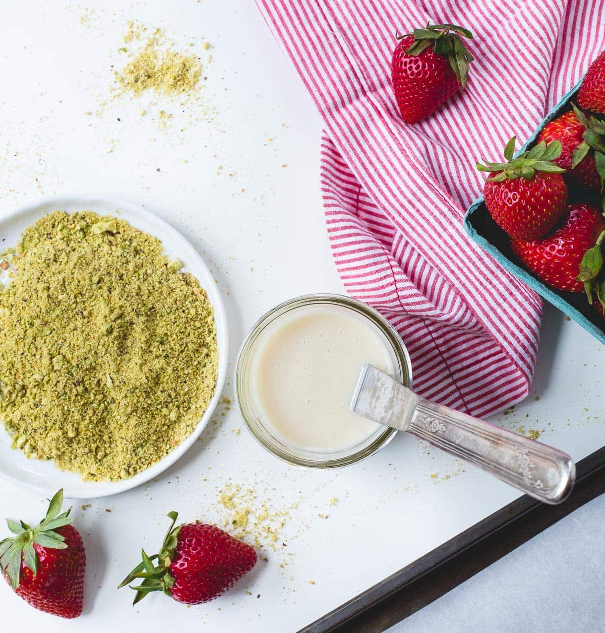 3 Ingredient Coconut Butter Dipped Strawberries with Pistachio Dust {paleo}