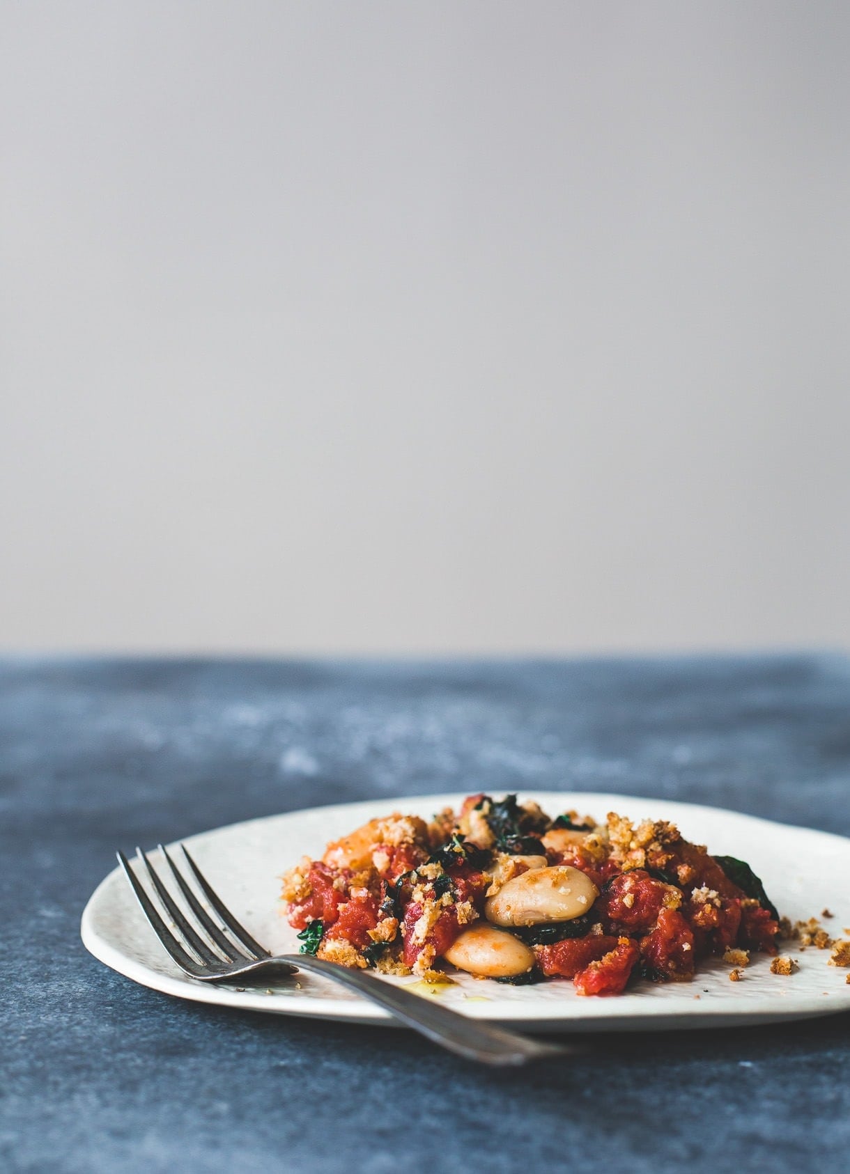 Cozy Gluten-Free Gratin with Butter Roasted Tomatoes, Beans and Kale