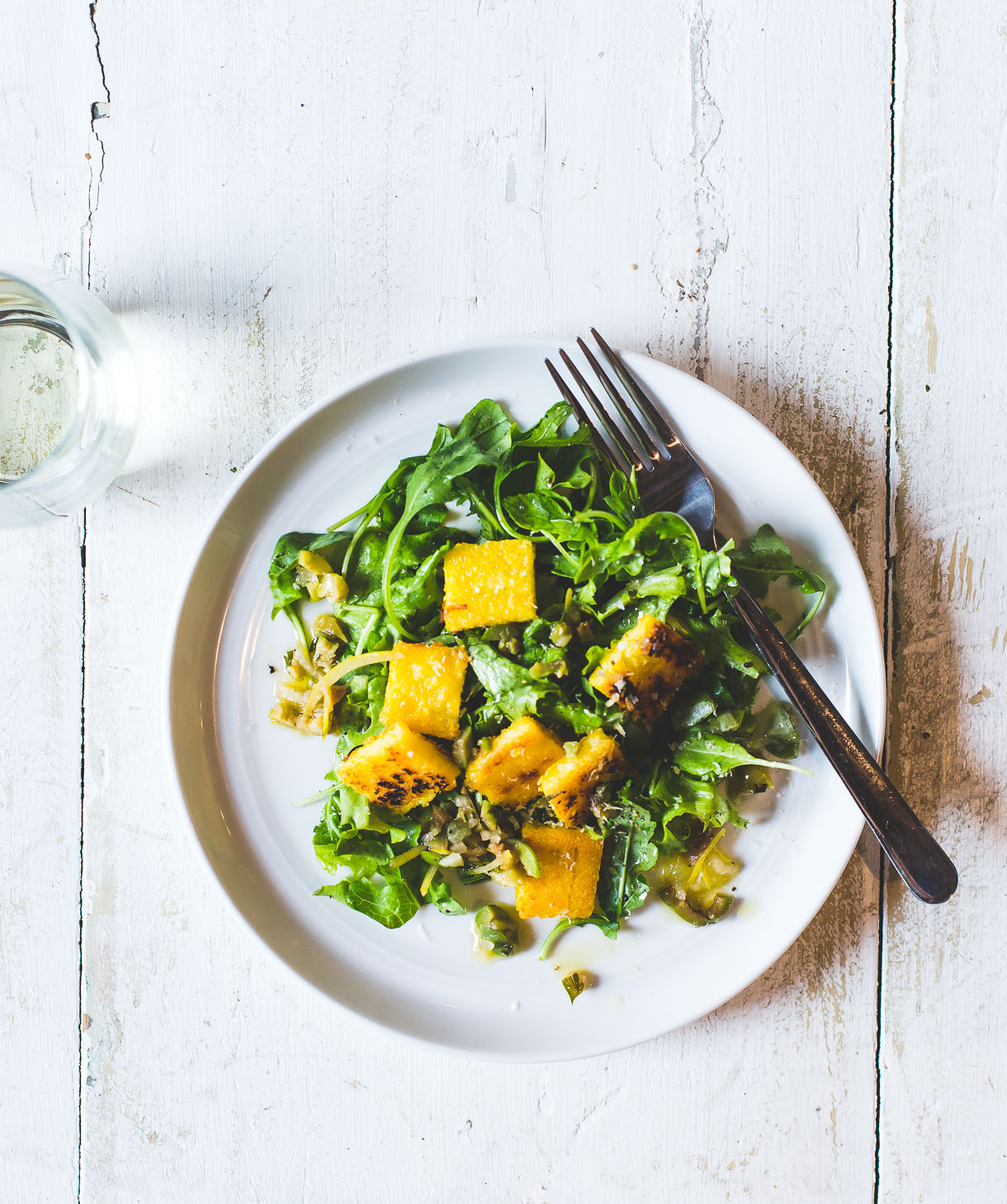Fried Polenta Squares with Mixed Greens + Lemon Olive Salsa