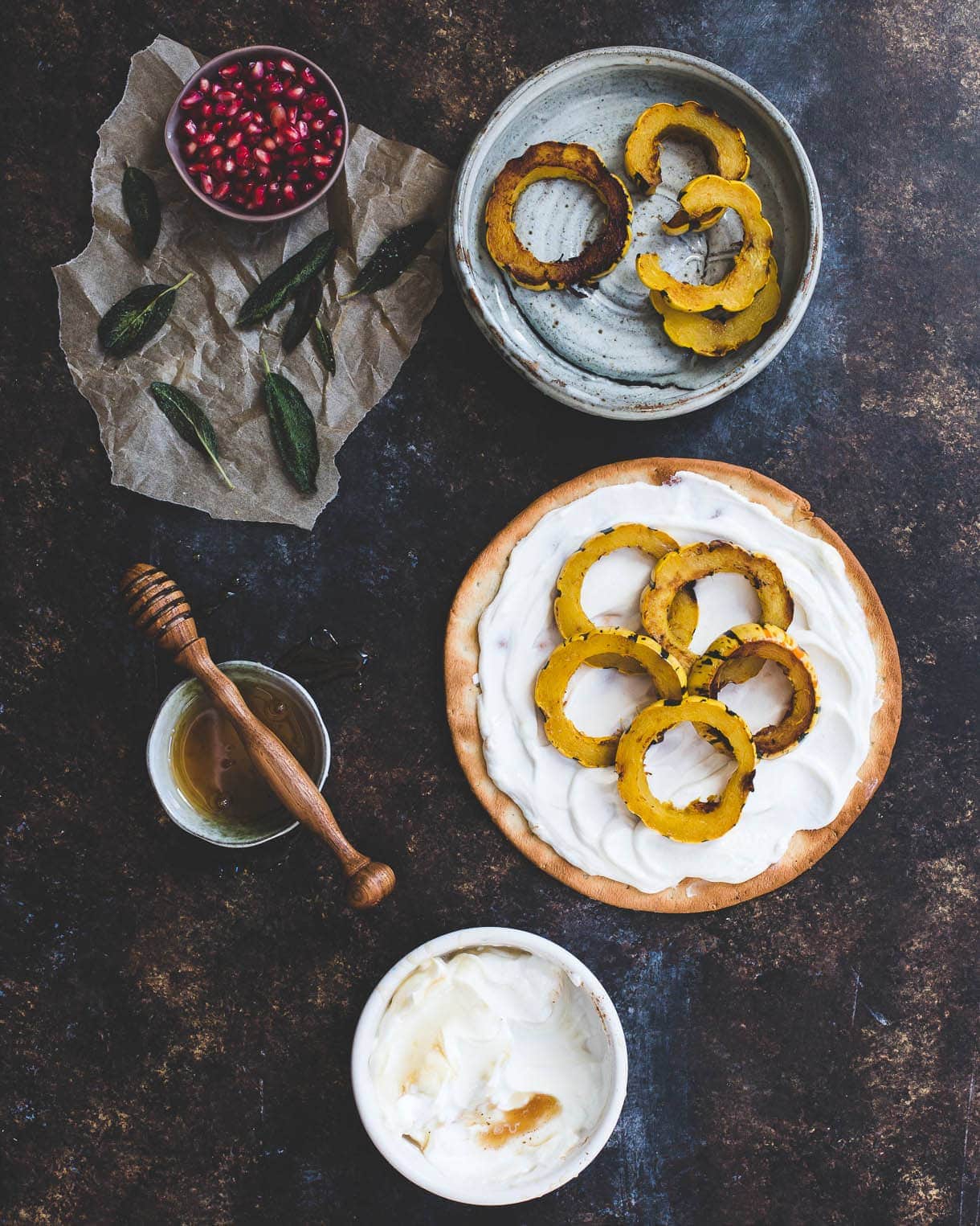 Sweet Delicata Pizza with Fried Sage, Pomegrante, and Honey Yogurt