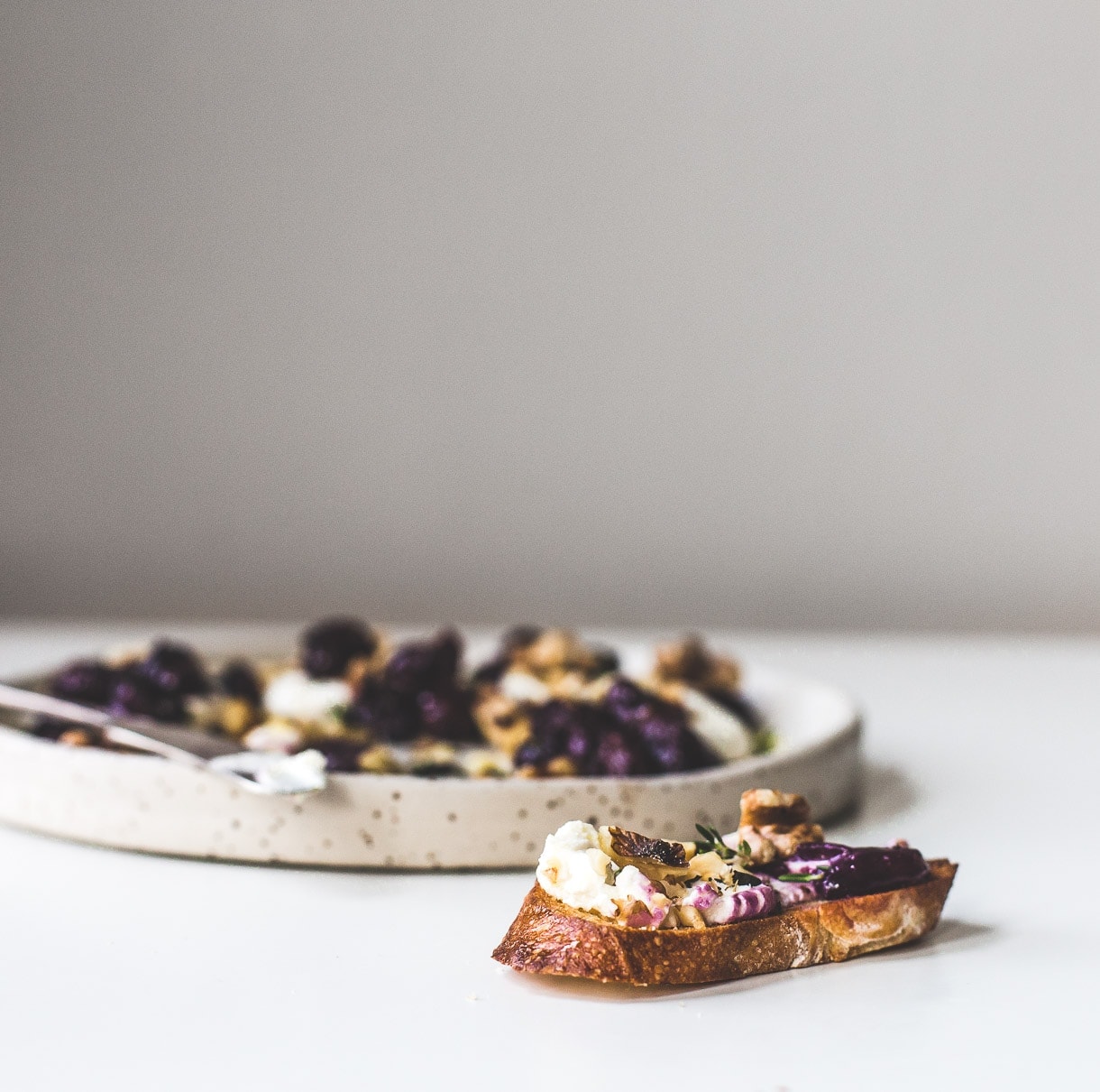 Marinated Goat Cheese with Roasted Grapes and Walnuts