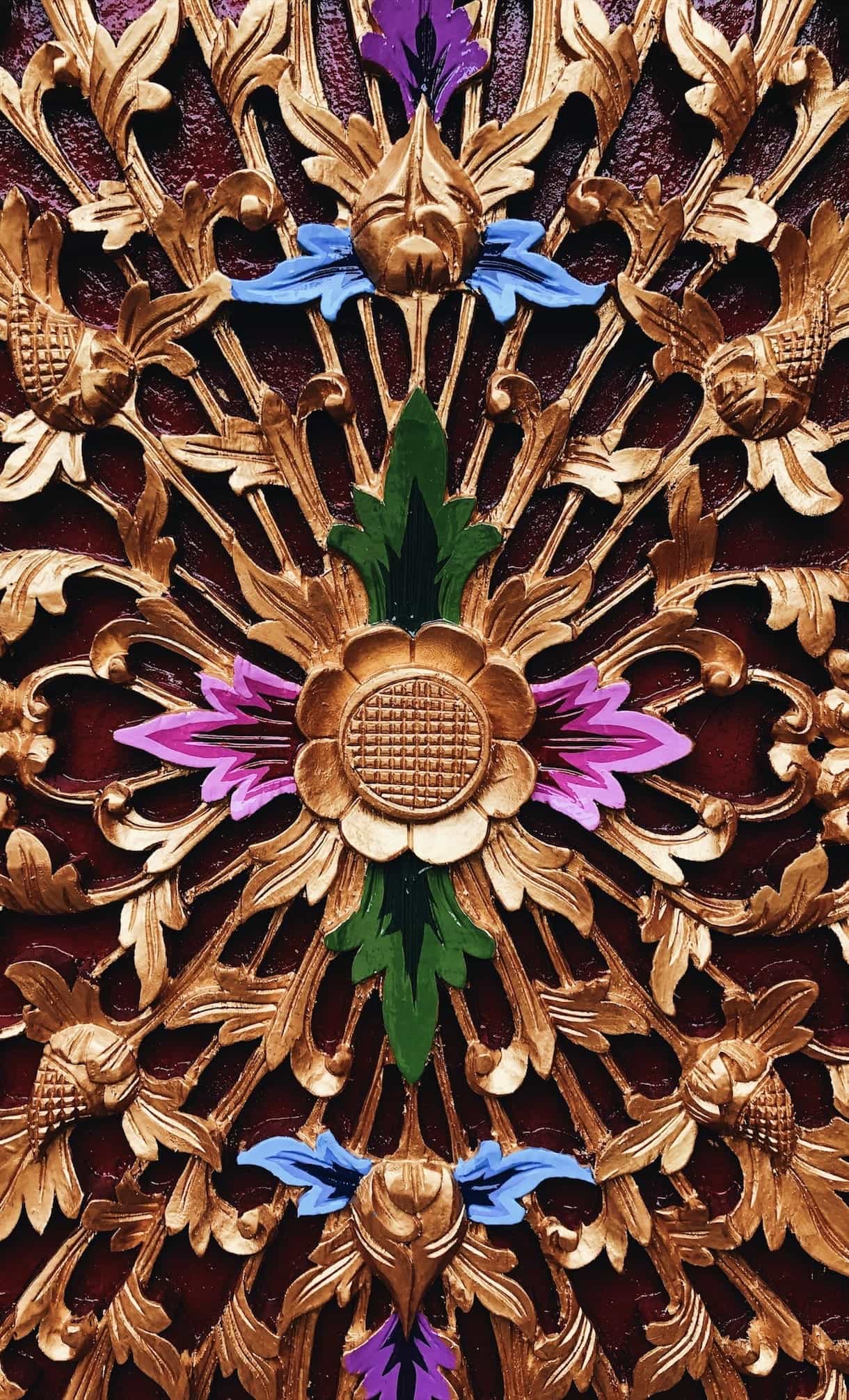 ornate door in bali, gold door