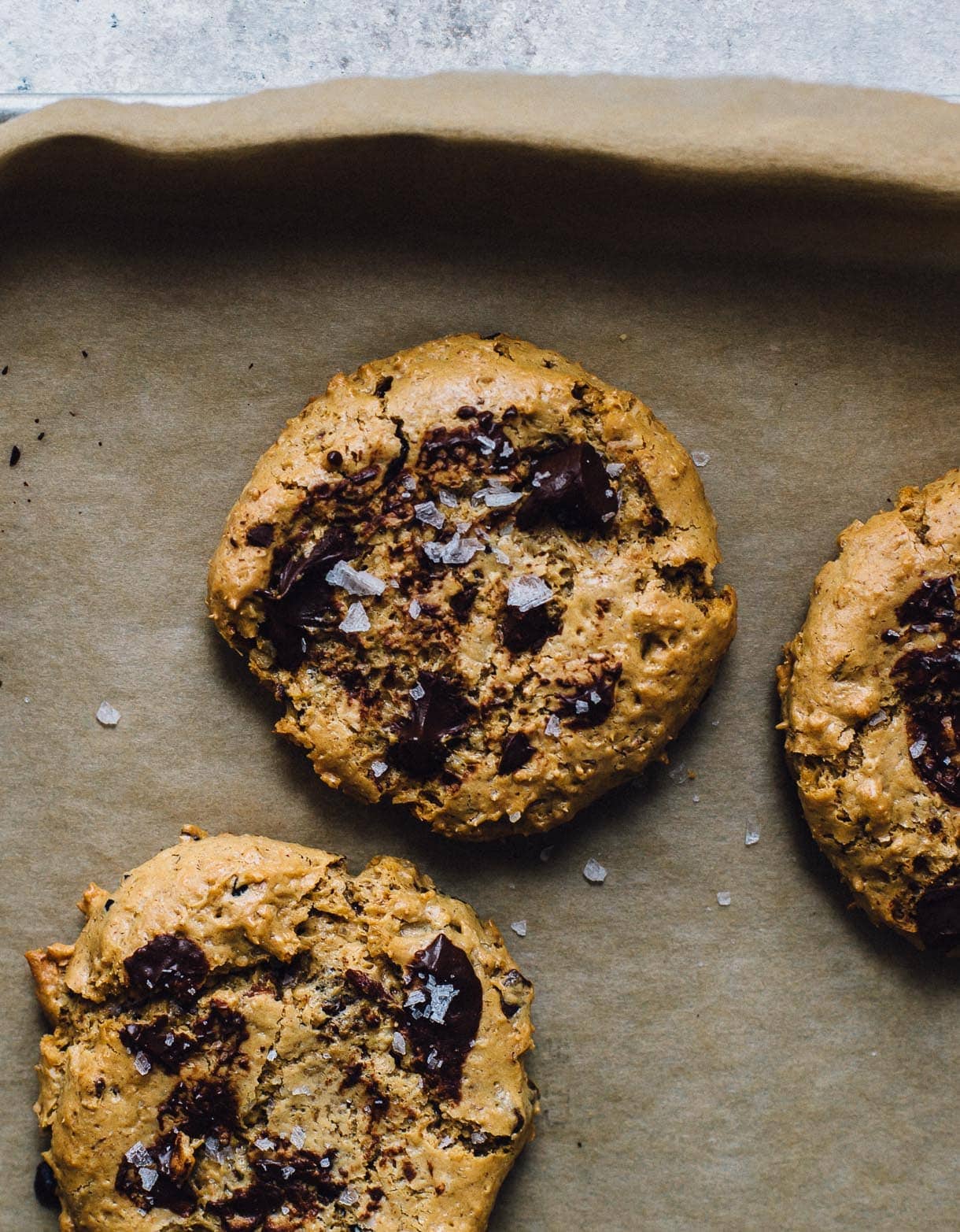 Flourless Peanut butter cookies with chocolate chips on parchment paper