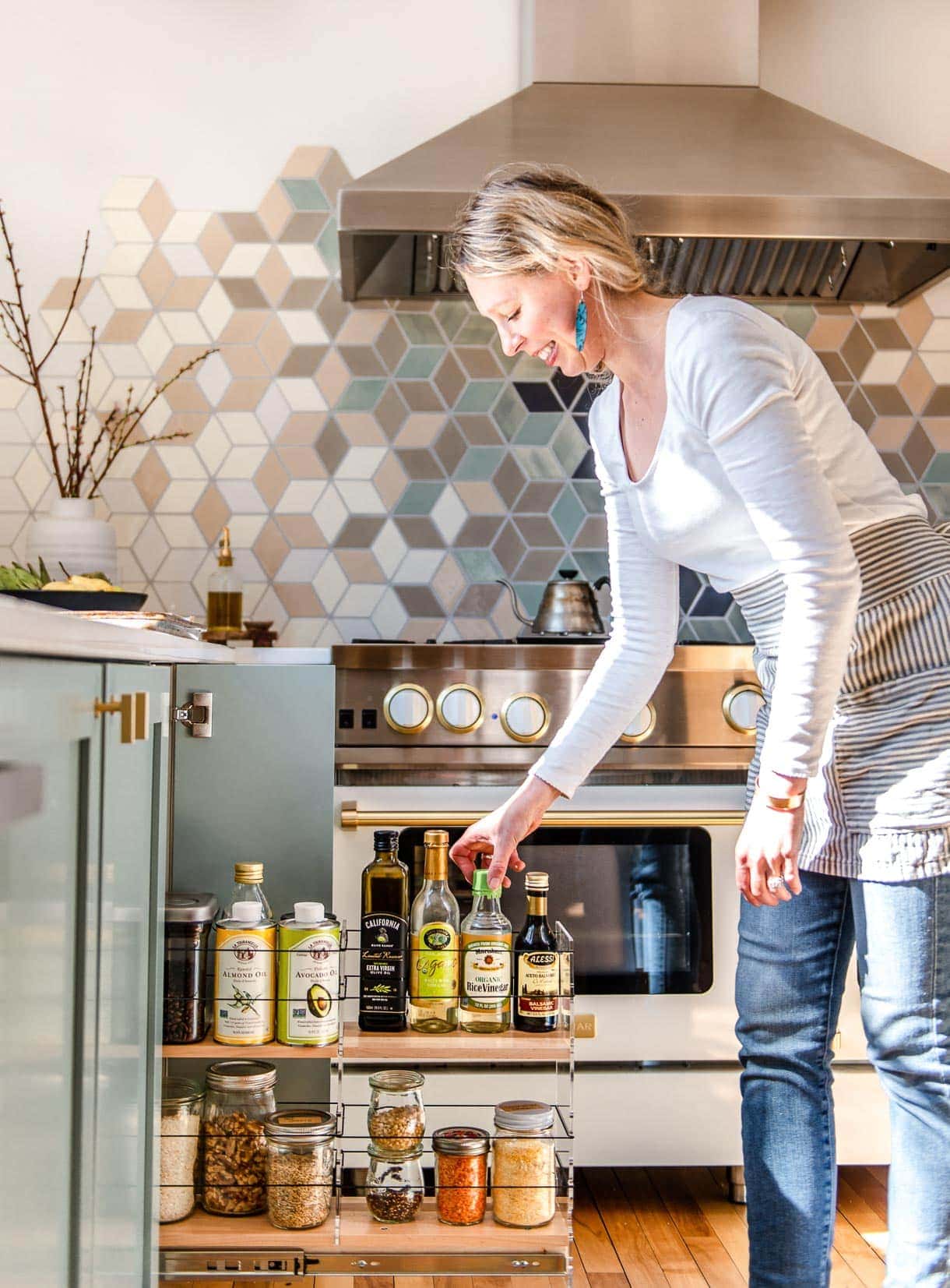Vertical Spice and Storage Unit slides out in a modern kitchen
