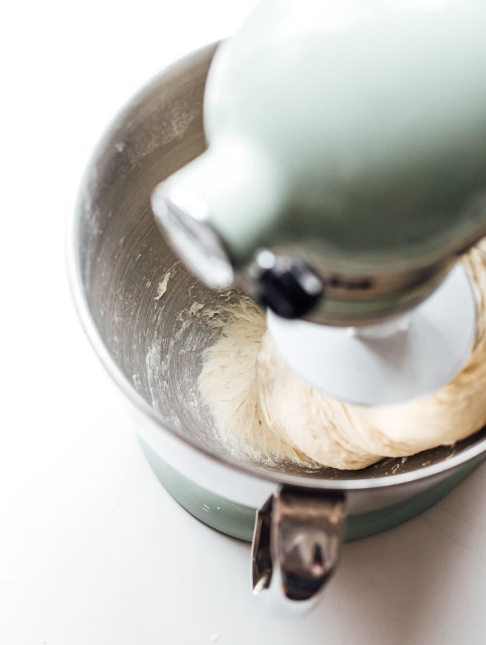 mixing english muffin dough in stand mixer
