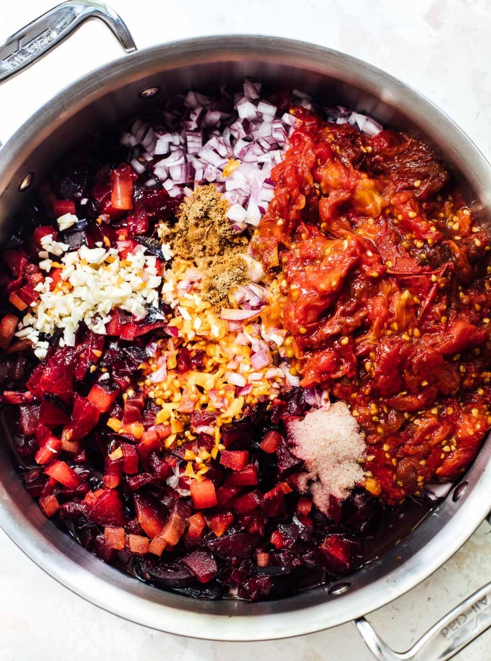 ingredients for plum habanero salsa in a large saucepan