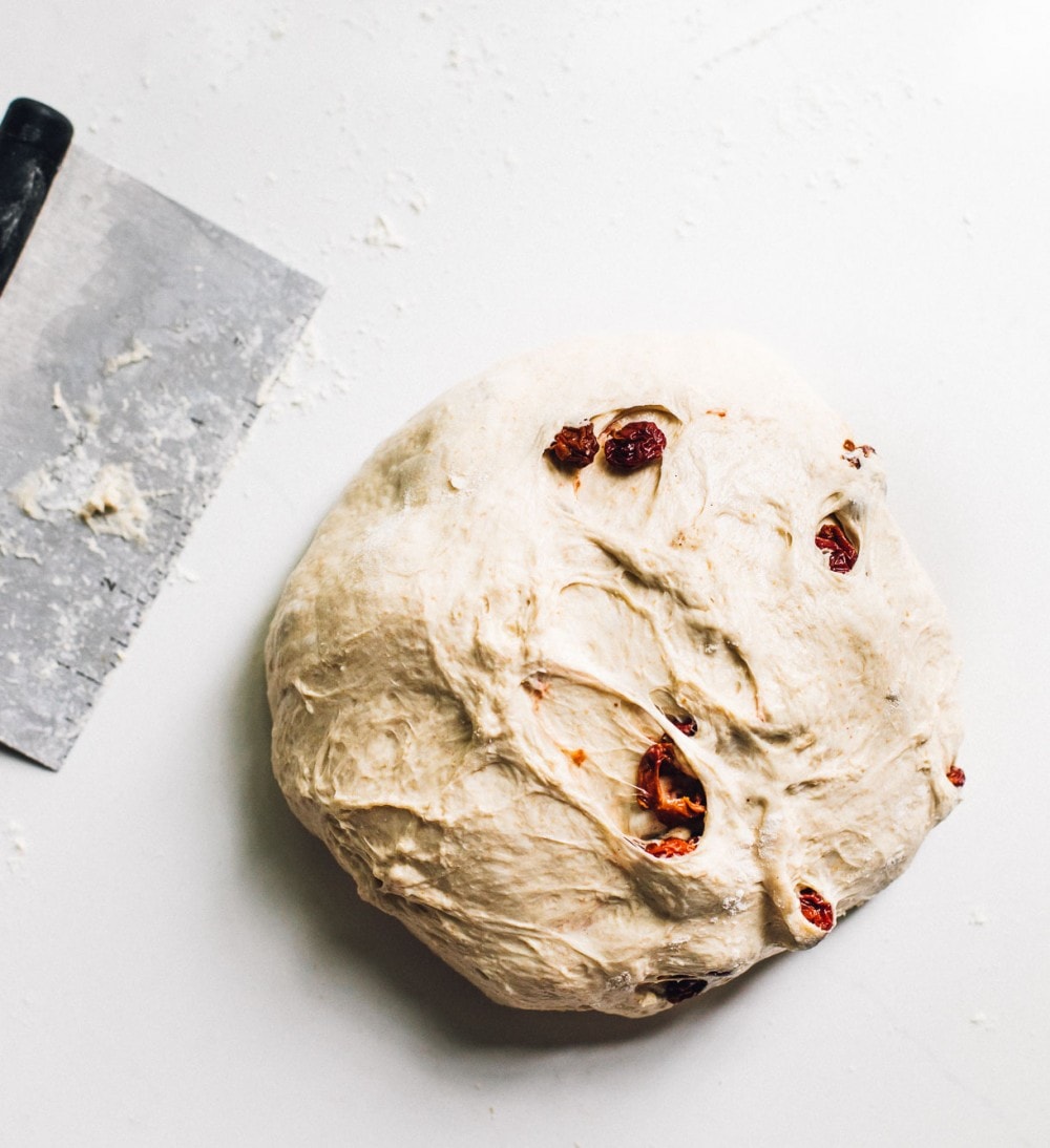 tart cherry sourdough in dough form, overhead photo
