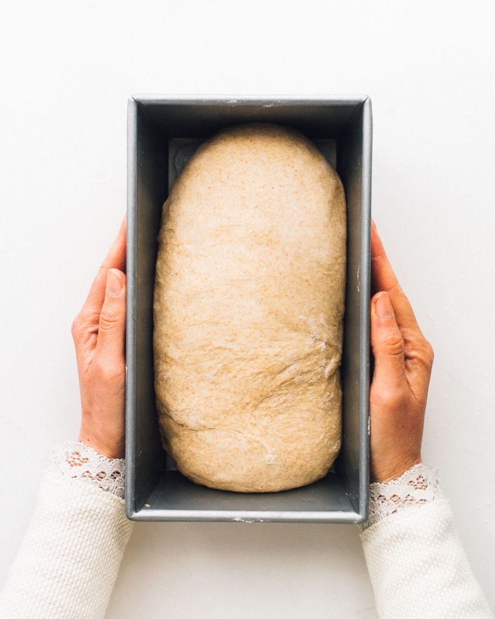 sourdough sandwich bread unbaked in a loaf pan