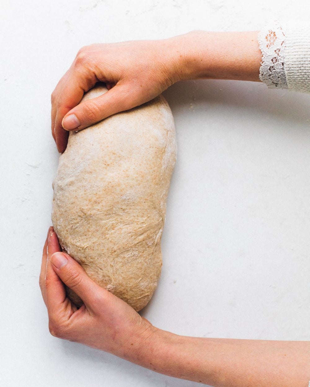 shaping sourdough sandwich bread