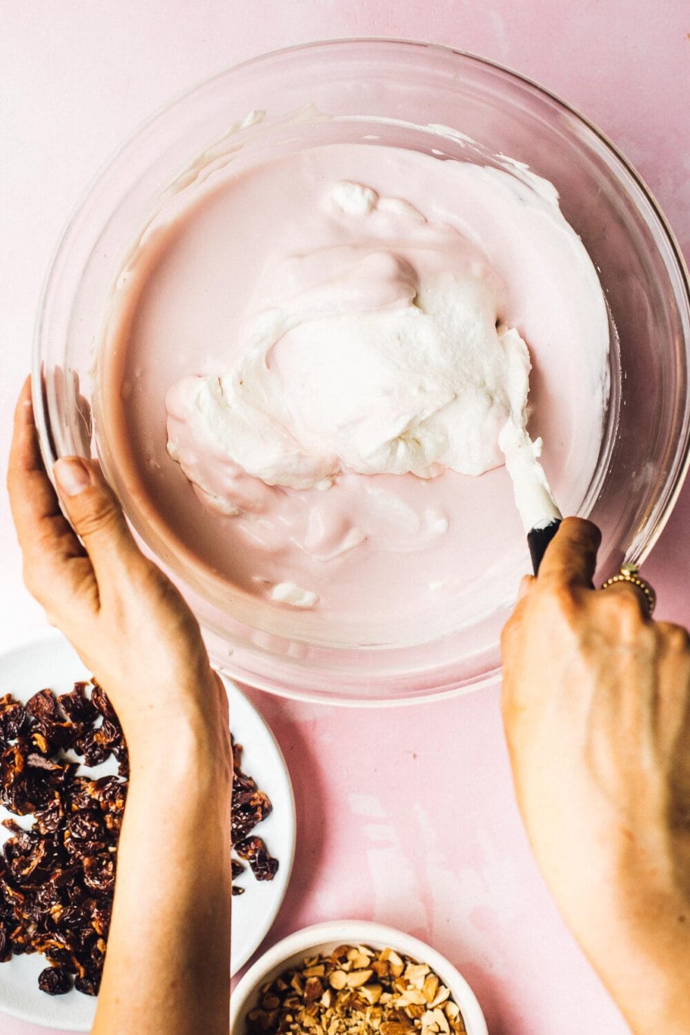 folding whipped cream into cherry ice cream base