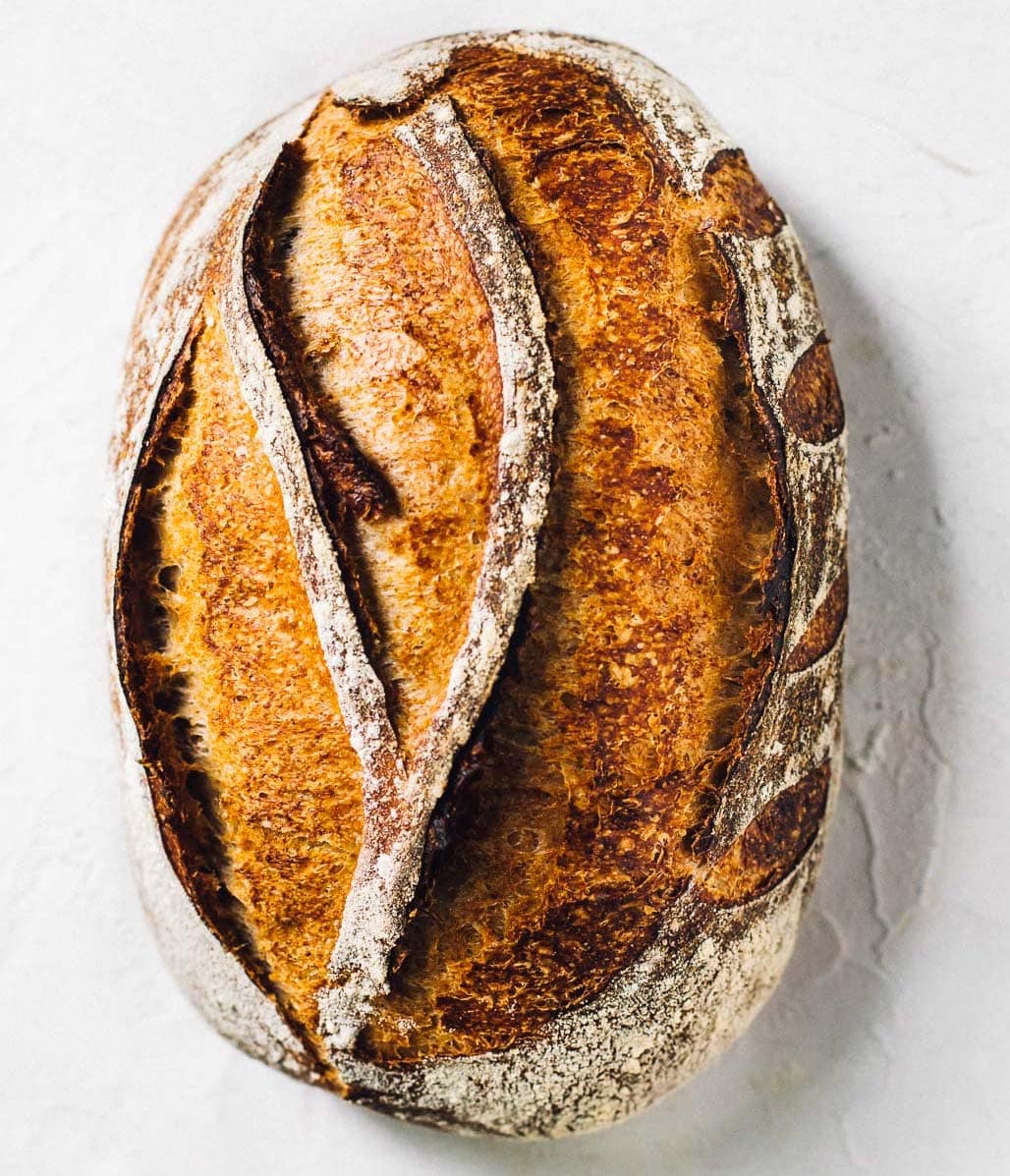 rye sourdough bread on a white surface