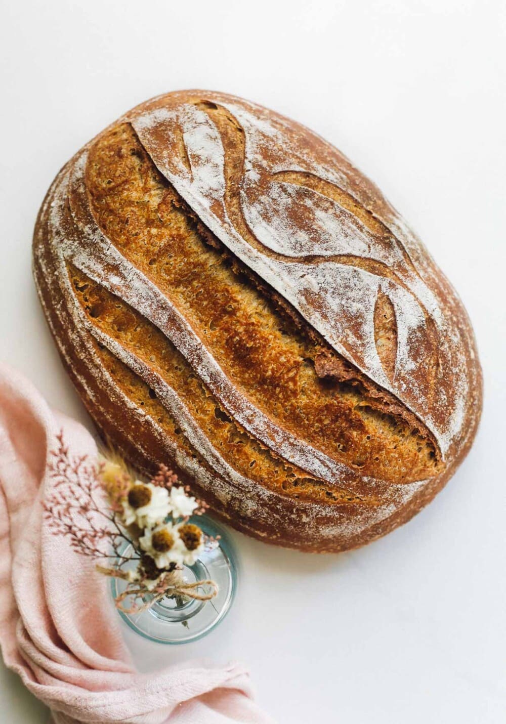einkorn sourdough bread on a white counter