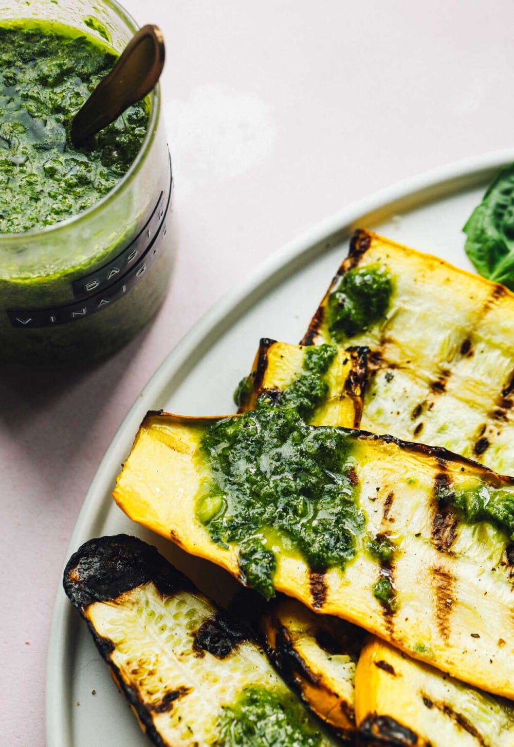 grilled summer squash with jar of basil vinaigrette