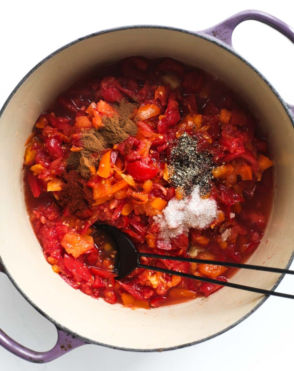 tomato jam ingredients in a large pot