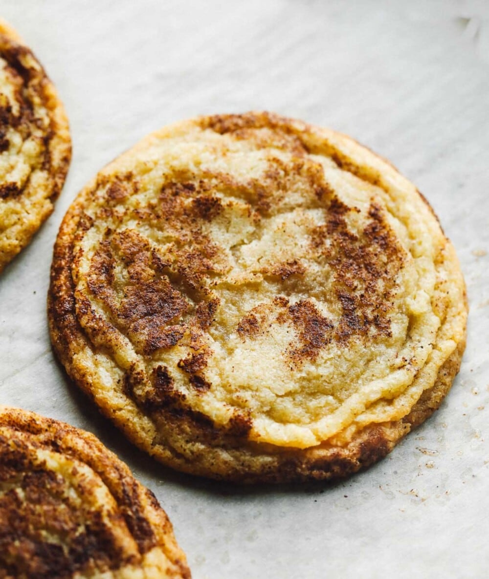 gluten free snickerdoodles on parchment paper