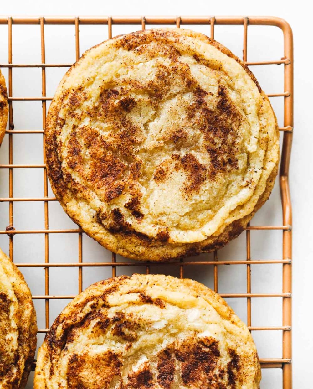 gluten free snickerdoodles on copper wire rack