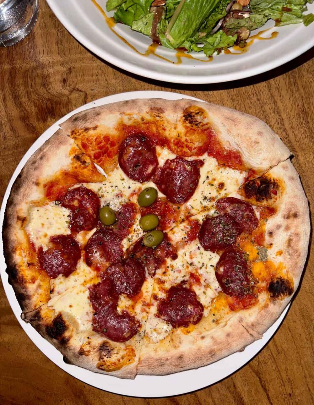 sourdough pizza with pepperoni on a plate