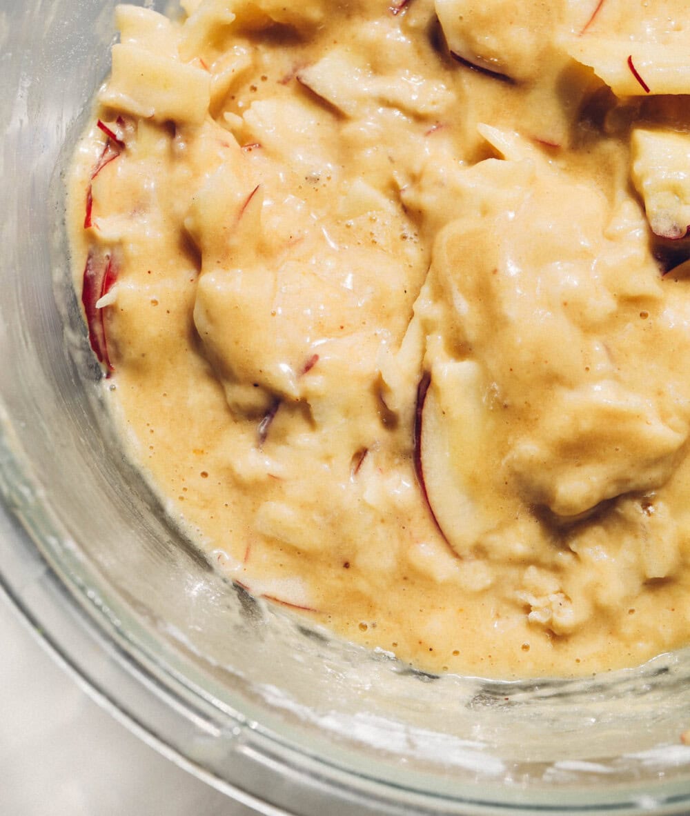 apple cake batter in a glass bowl