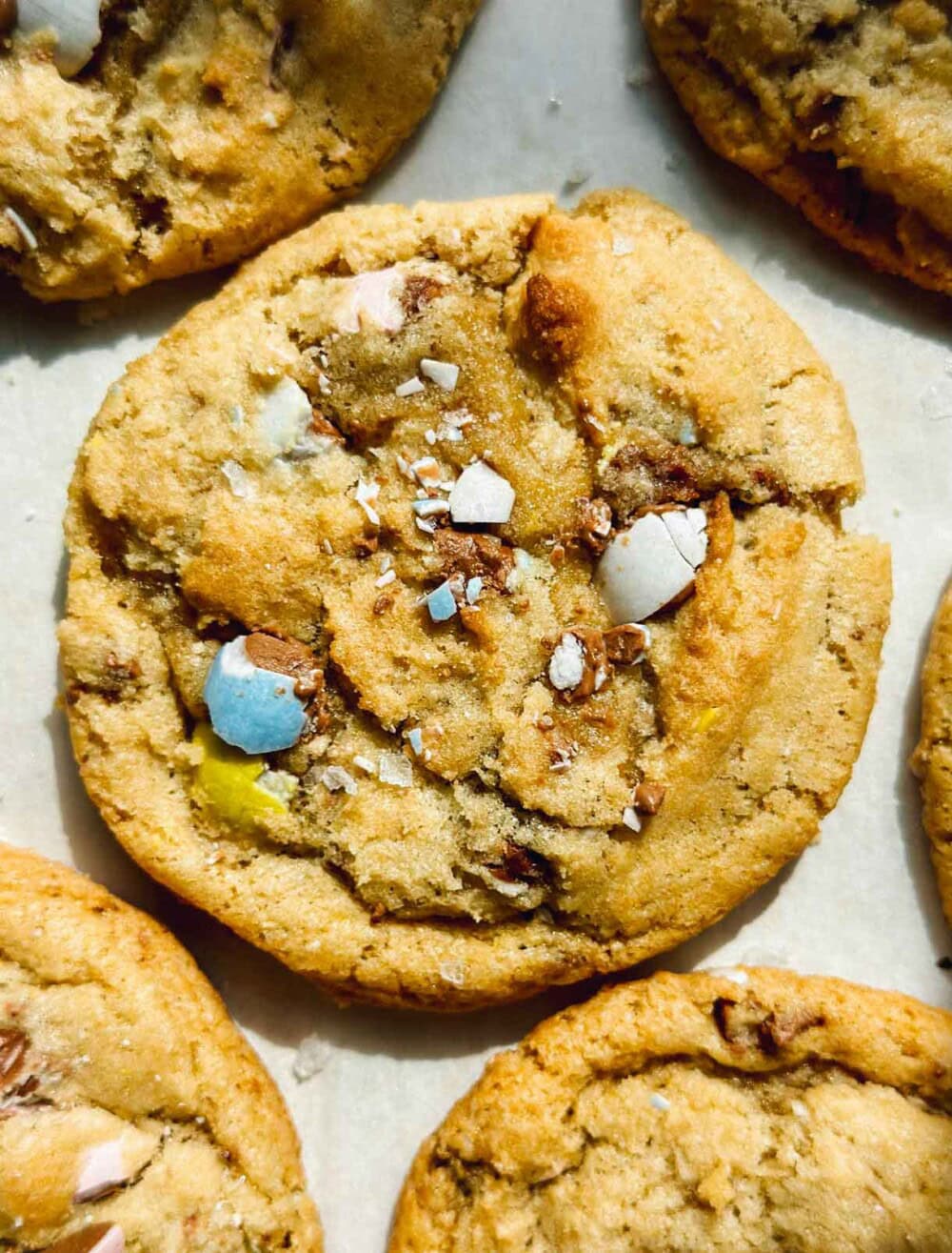 sourdough cadbury egg cookies on parchment paper