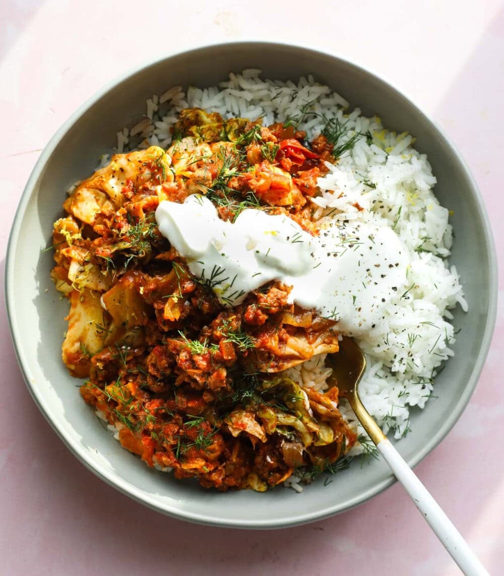 a cabbage roll in a blue bowl