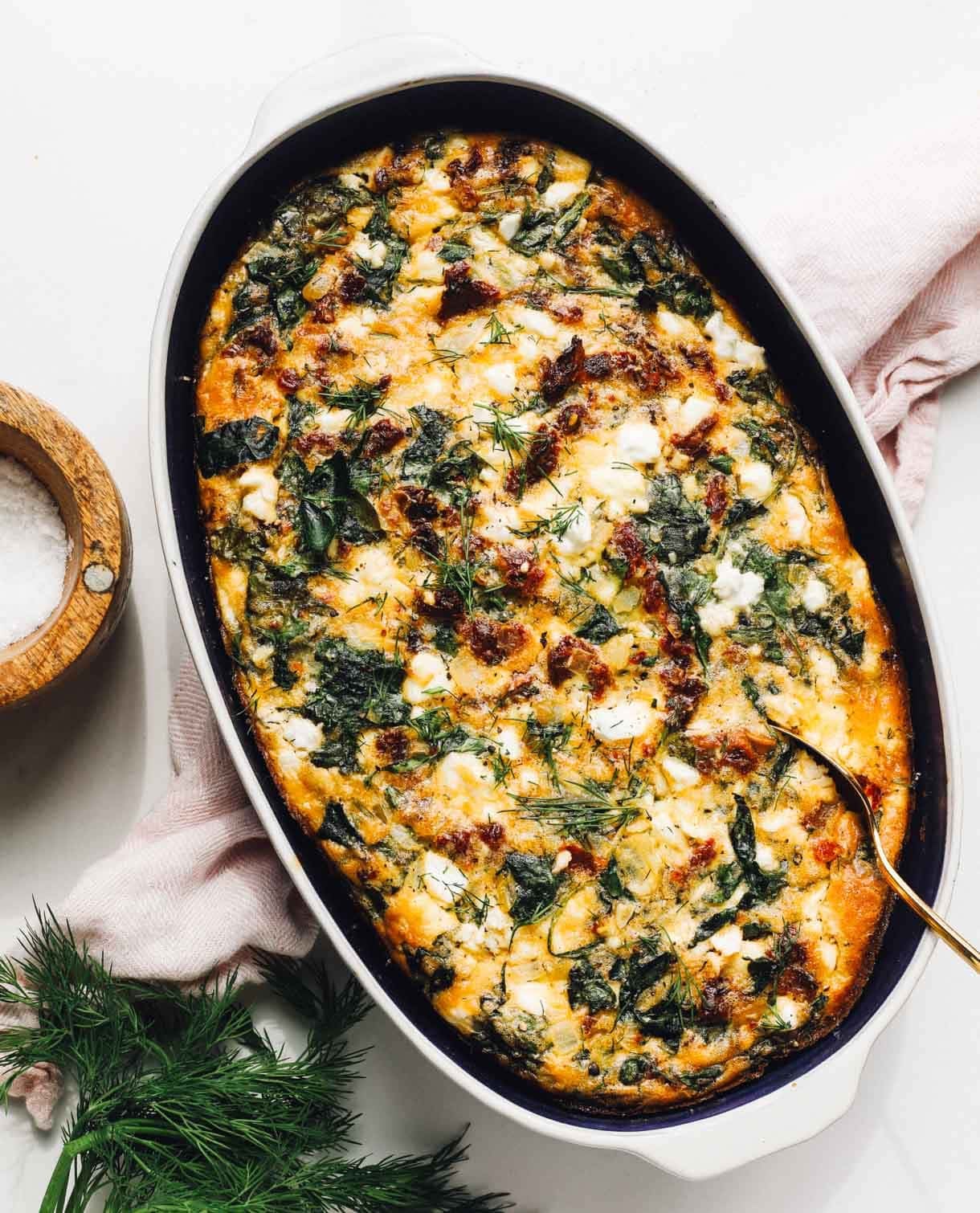 Delicious baked egg dish with sun-dried tomatoes, cottage cheese, and fresh herbs. Perfect for brunch.